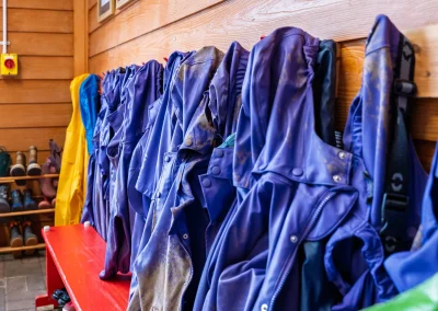 Waterproof coats and boots ready for outdoor play at Little Gems preschool