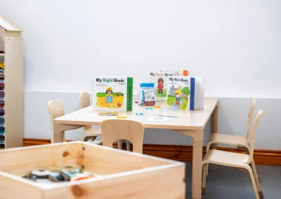 Children's books and learning table at Monmouth Day Nursery